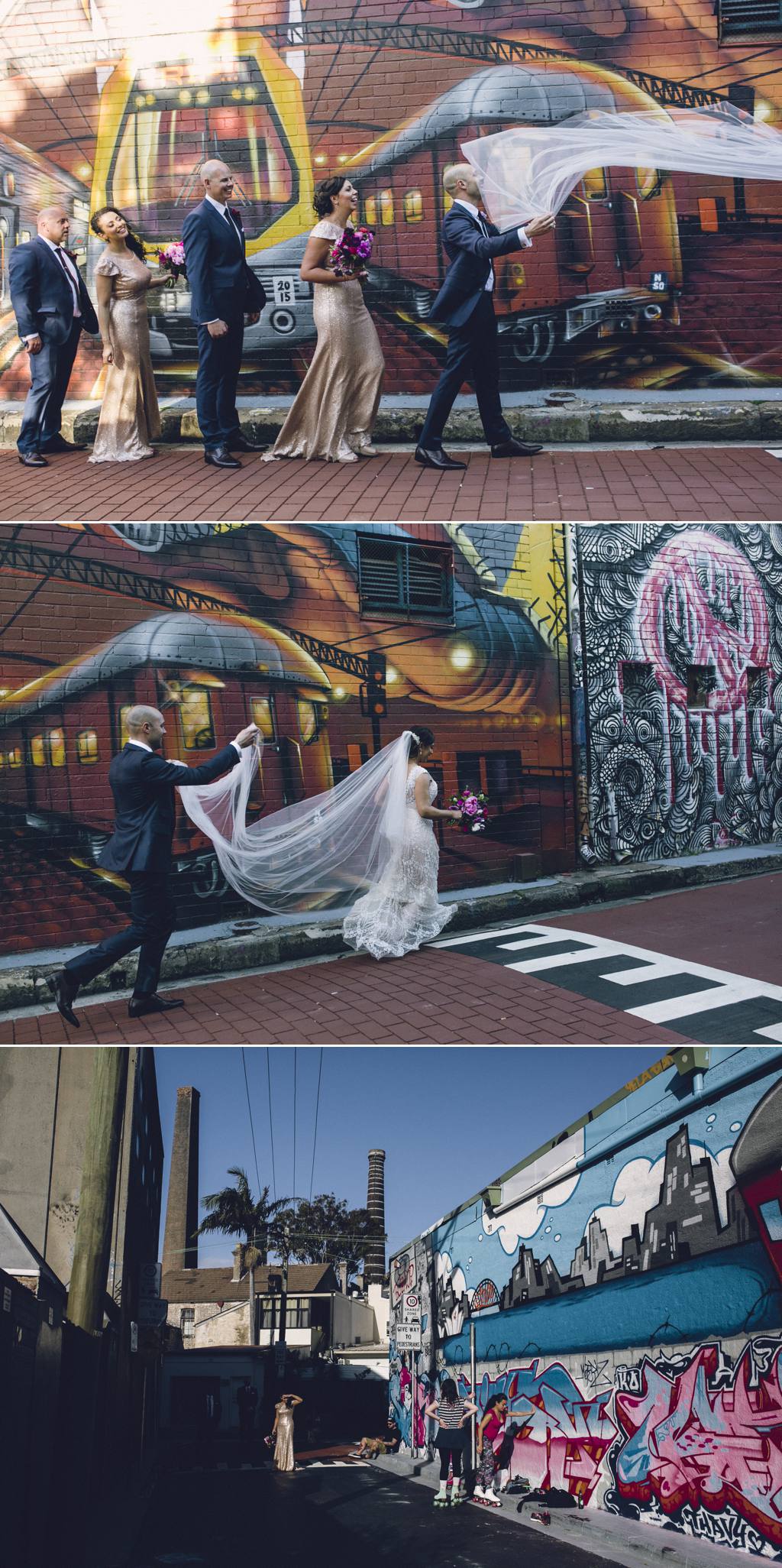Bride and groom with graffiti wall 